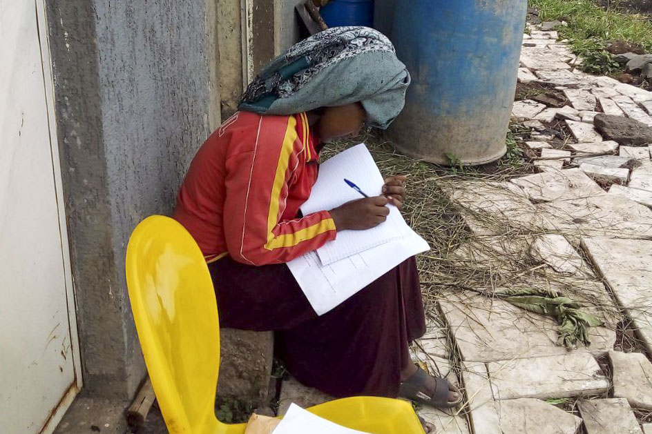 A citizen scientist journaling following a flood event in Akaki, Ethiopia. Photo: Tilaye Worku Bekele